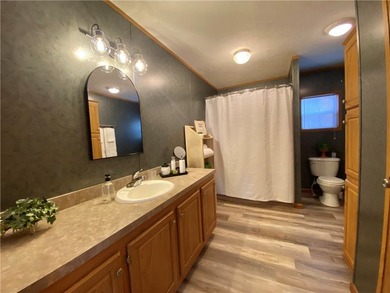 Nestled along the serene shores of Seneca Lake, this ranch - photo 30