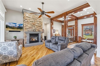 Set on the private waters of Treeline Lake in Four Seasons, this - photo 6