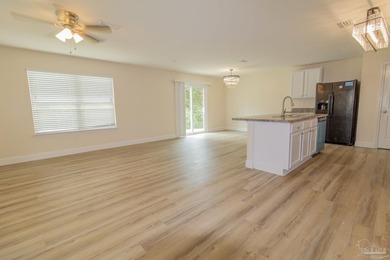 Welcome home to this beautifully refreshed 3-bedroom, 2 - photo 4