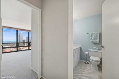 Exquisite living at the sought-after Americana Towers in the