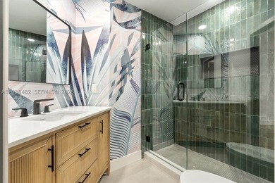 Located in Boca Grove, this charming remodel features a - photo 17
