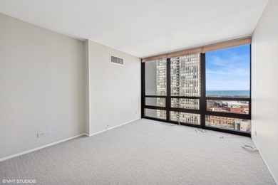 Exquisite living at the sought-after Americana Towers in the