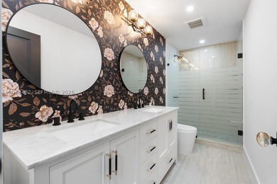 Located in Boca Grove, this charming remodel features a - photo 21