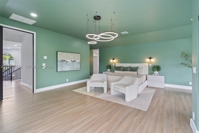 Located in Boca Grove, this charming remodel features a - photo 22
