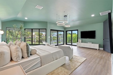 Located in Boca Grove, this charming remodel features a - photo 24