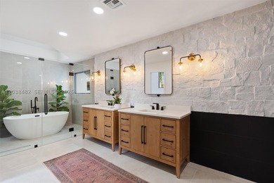 Located in Boca Grove, this charming remodel features a - photo 25