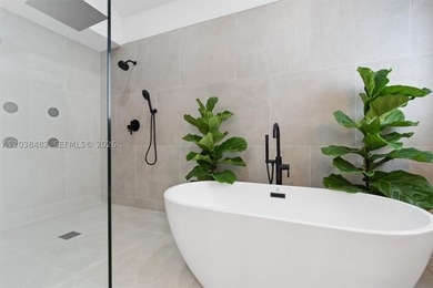 Located in Boca Grove, this charming remodel features a - photo 26