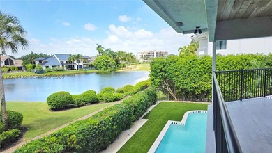 Located in Boca Grove, this charming remodel features a - photo 28