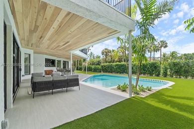 Located in Boca Grove, this charming remodel features a - photo 30