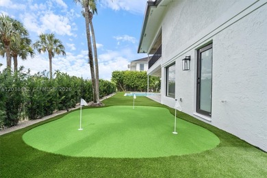 Located in Boca Grove, this charming remodel features a - photo 31