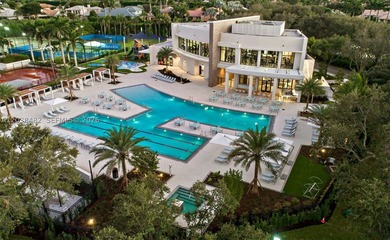 Located in Boca Grove, this charming remodel features a - photo 35