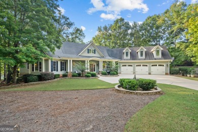 Welcome to this stunning craftsman-style home located in one of - Lake Home For Sale in Greensboro, Georgia