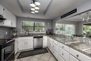Nestled within the prestigious, wooded shores of Lake Hamilton - photo 14