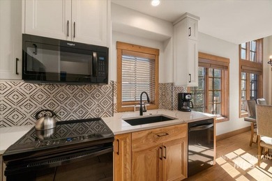 Experience elevated mountain living in this Trillium Townhome at - photo 8