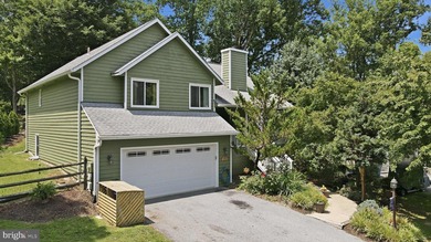 Welcome to this beautifully maintained home in the highly - photo 1