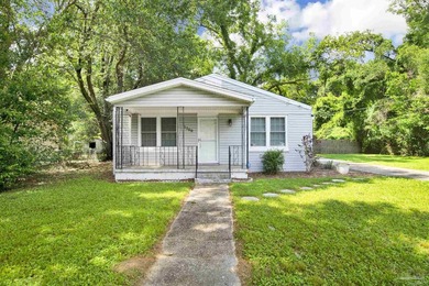 SHORT SALE / AS IS -- Welcome to this charming 3-bedroom - photo 1