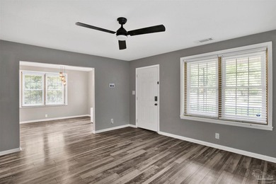 SHORT SALE / AS IS -- Welcome to this charming 3-bedroom - photo 5