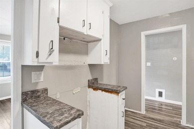 SHORT SALE / AS IS -- Welcome to this charming 3-bedroom - photo 10