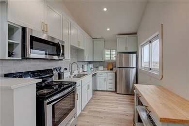 This income producing, Port Aransas home is a bright, airy - photo 14