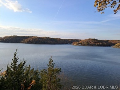 Wake up each day to breathtaking panoramic lake views from this - photo 1