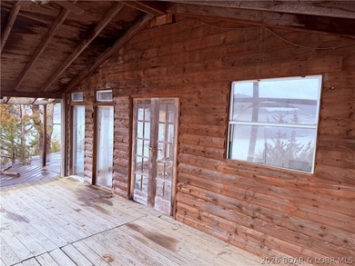 Wake up each day to breathtaking panoramic lake views from this - photo 4