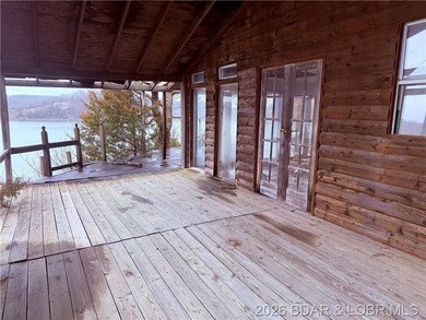 Wake up each day to breathtaking panoramic lake views from this - photo 5