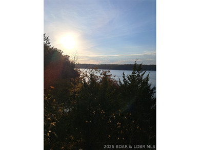 Wake up each day to breathtaking panoramic lake views from this - photo 10