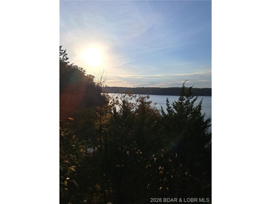 Wake up each day to breathtaking panoramic lake views from this - photo 10