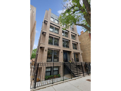 Welcome to this exceptional 4-bedroom, 3.1-bath duplex residence - photo 1