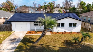 Completely Remodeled & Perfectly Located in Lynn Haven! Welcome - photo 3
