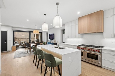 Welcome to this exceptional 4-bedroom, 3.1-bath duplex residence - photo 8