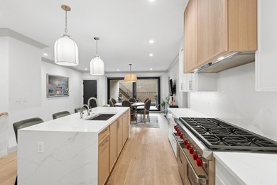 Welcome to this exceptional 4-bedroom, 3.1-bath duplex residence - photo 9