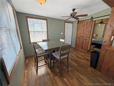 Enjoy the ease of lake living in this updated home with a swim - photo 6