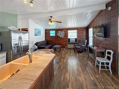 Enjoy the ease of lake living in this updated home with a swim - photo 10