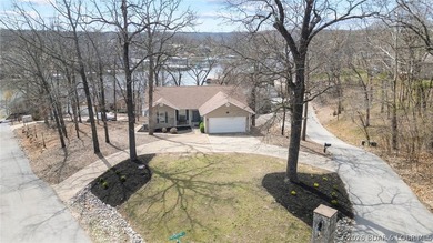 Experience elevated lakefront living in this luxury 4-bedroom, 3 - photo 1