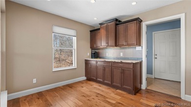 Experience elevated lakefront living in this luxury 4-bedroom, 3 - photo 6