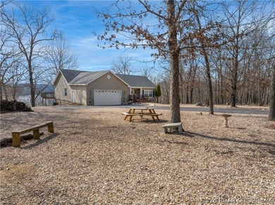 Unique country home with impressive lake views on 9.7 acres & a - photo 3