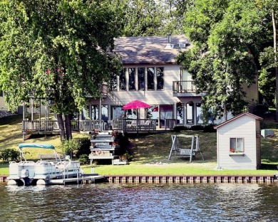 ENJOY LAKEFRONT LIVING AND AN INDOOR POOL!! - Lake Home For Sale in Oscoda, Michigan