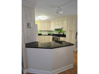 This well maintained 2/2 is ready for move in. No hurricane - photo 9