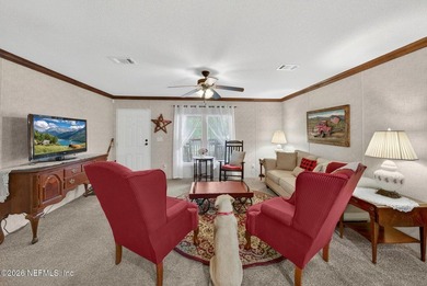 Welcome home to this beautifully maintained 2019 manufactured - photo 11