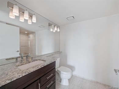 Highly sought-after Birmingham Place condo offering luxury - photo 12