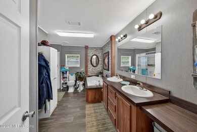 Welcome home to this beautifully maintained 2019 manufactured - photo 21