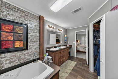 Welcome home to this beautifully maintained 2019 manufactured - photo 22