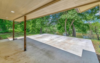 Welcome to peaceful riverfront living at its finest. This - photo 25