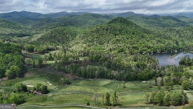 Nestled along the fairways of Waterfall at Lake Burton, this - photo 3