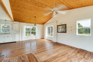 Set on 17 scenic acres in Michigan's Upper Peninsula, this - photo 4