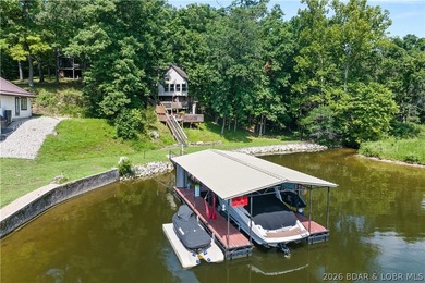 Discover peace and tranquility in this stunning lakefront home - photo 1