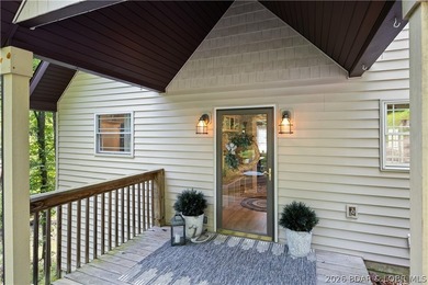 Discover peace and tranquility in this stunning lakefront home - photo 3