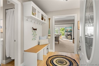 Discover peace and tranquility in this stunning lakefront home - photo 4