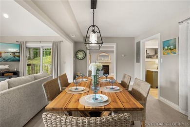 Discover peace and tranquility in this stunning lakefront home - photo 8